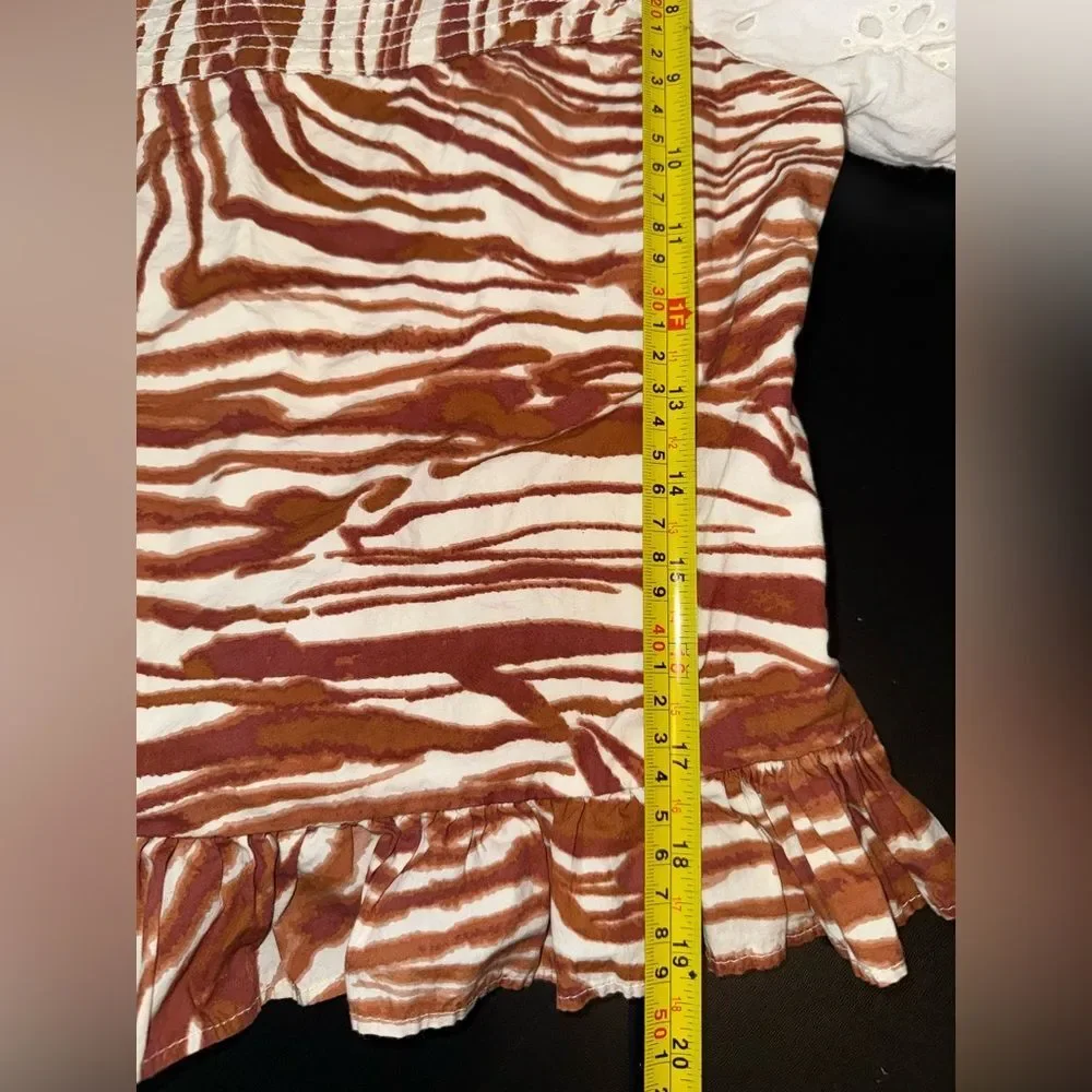 Anthropologie love the label Zebra Print Eyelet Puff sleeve smocked blouse S EUC